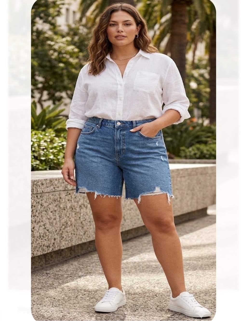 Good American Mid-Blue Distressed Frayed Denim Shorts